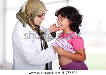 Young muslim  doctor in his office