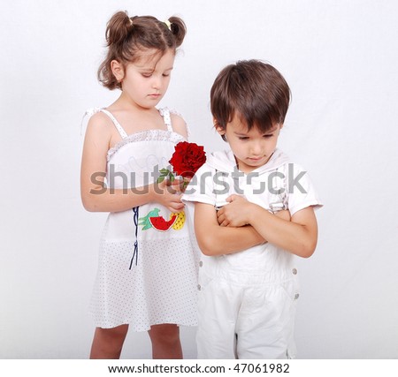 Beautiful scene of a boy and girl with rose