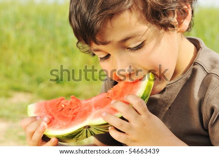 Eating watermelon outside