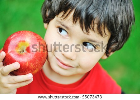 Holding Red Apple