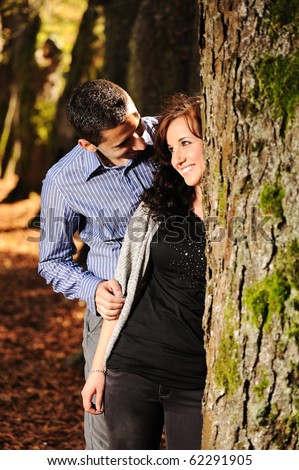 Lovers teenagers in nature talking with each other and falling in love :) - trees, forest, fall, yellow and red ground