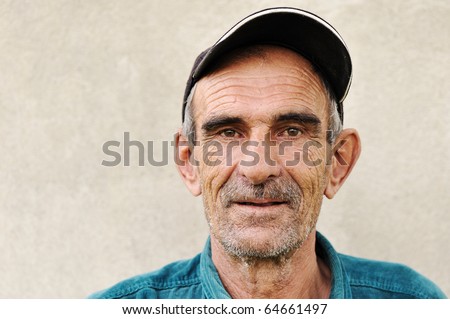 stock photo Elderly old mature man with hat portrait