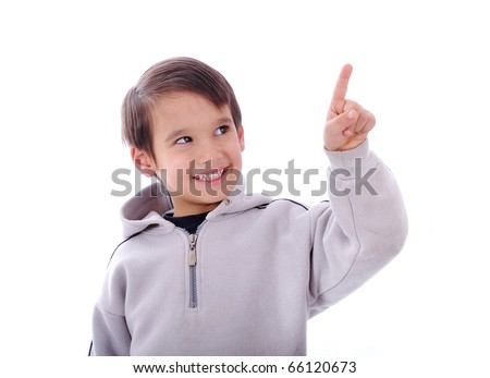 The boy smiles and shows a finger up, copy-space, you simply can put your digital button on top of his finger