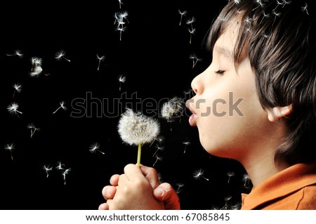 Blowing flower, kid on black background