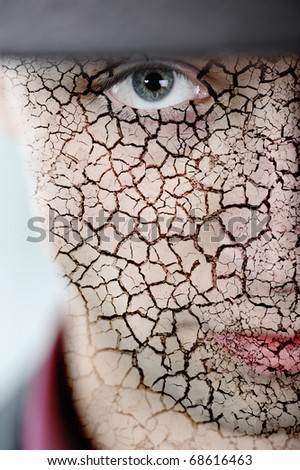 Young man with cracked skin