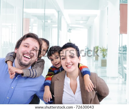 Young family with two children in the shopping mall