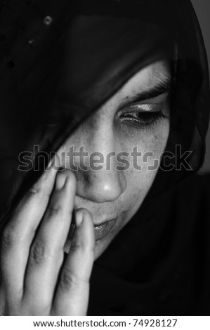 Pain, abused woman crying in dark