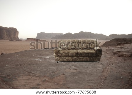 Couch sofa outdoor in the desert, no people around