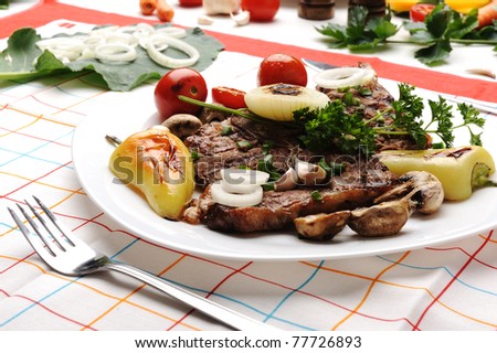 Beautiful served food on plate, meat with natural vegetables ingredients