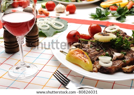 Beautiful served food on plate, meat with natural vegetables ingredients