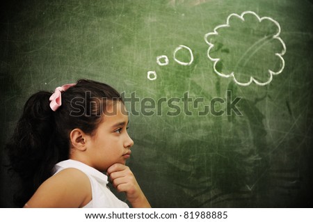 Education activities in classroom at school, smart girl thinking, copy space