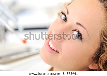 Beautiful young woman at dentist office