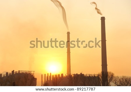 Industry, big chimney at sunset