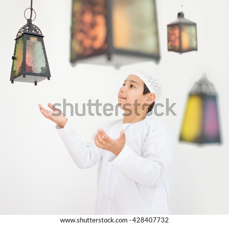 Happy child ready for Ramadan with lantern