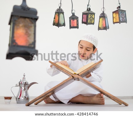 Happy child ready for Ramadan with lantern