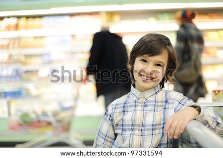 Boy In Supermarket