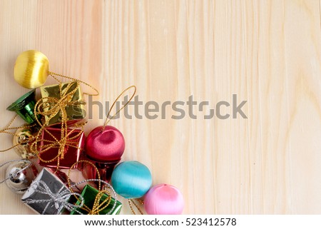 christmas gifts decoration on antique rustic wooden background; above view looking down with wood , top view with wood copy space