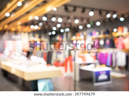 Blurred showcases fashion boutique with sportswear . Blurred bokeh basic background for design.