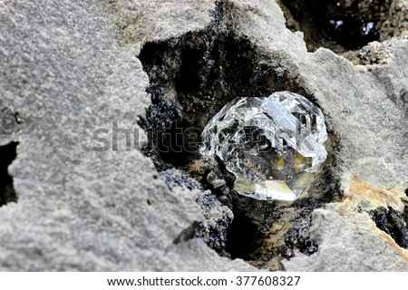 herkimer diamond nestled in bedrock