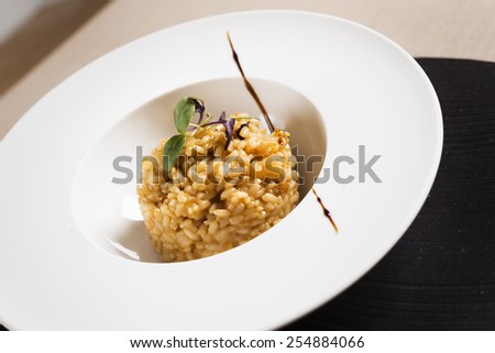 White plate with a nice presentation of a typical Mediterranean rice