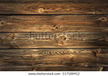 Grunge rich wood grain texture background with knots.