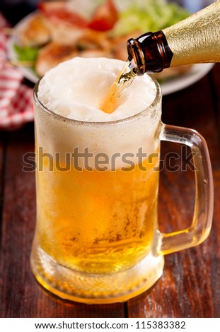 Beer pouring into mug