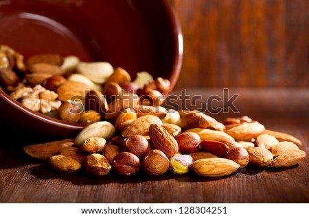 Mix Nuts On A Wooden Table