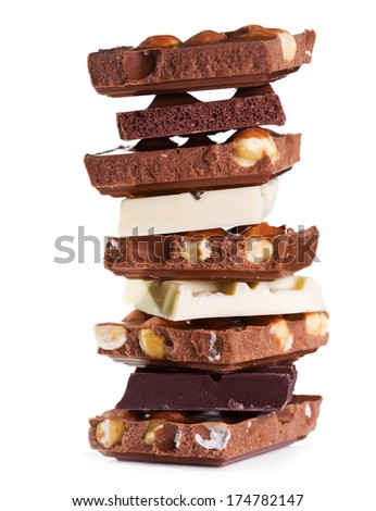 stack of various  pieces of chocolate  on white background
