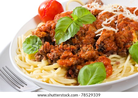 spaghetti with meat sauce on white background