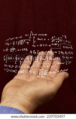 Several mathematical formulas float above a hand.