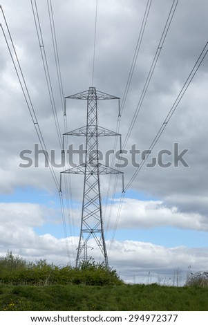 Tall electrical transmission towers at hydro-elecctric dam