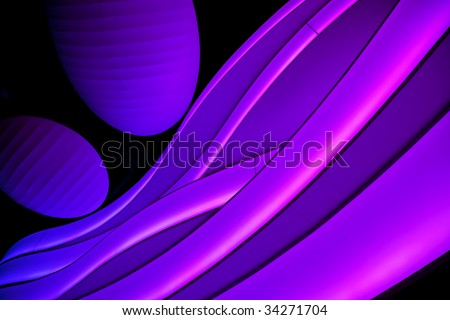 Beautiful Multicolored bands and orbs of glowing pink , blue and purple  lights with black lines throughout.