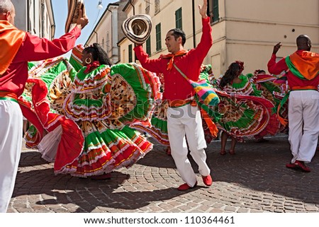 RUSSI, ITALY - AUGUST 5:  ensemble Jocaycu from Colombia - colombian dancers in traditional dress performs popular dance at International folk festival on August 5, 2012 in Russi, Ravenna, Italy