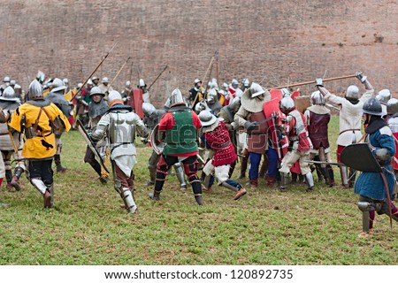 TERRA DEL SOLE, ITALY - SEPTEMBER 29: warriors in historical re-enactment of medieval battle at festival devoted to the life in middle ages \