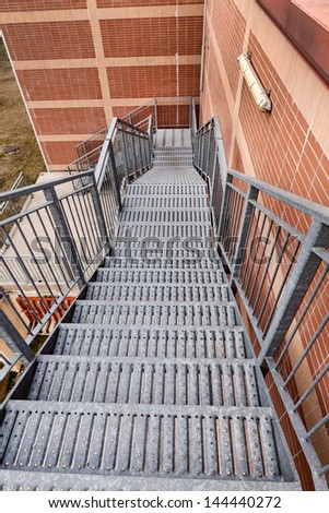 Fire escape ladder - metal stairs on the side of a building