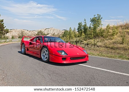 BRISIGHELLA, RA, ITALY  - AUGUST 31: unidentified driver on a italian sports car Ferrari F40 at rally \