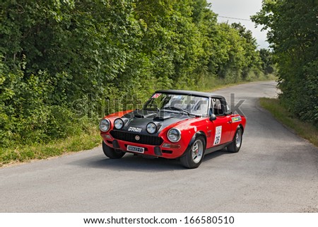 MELDOLA, FC, ITALY - JUNE 2: unidentified crew on a vintage racing car Fiat 124 Abarth (1973) runs in rally \