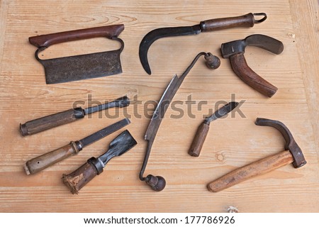 old tools of carpentry for carving, smoothing or cutting wood - ancient woodworking hand tools to cut, carve, smooth