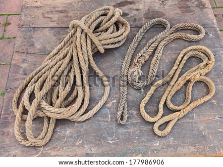 old ropes of hemp fiber  - ancient rope of natural fibers with eye splice