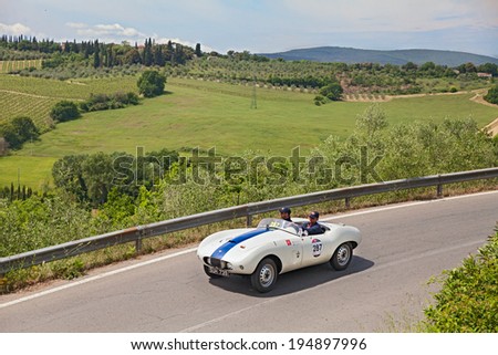 COLLE DI VAL D\'ELSA, SI, ITALY - MAY 17: unidentified crew on a vintage sport car Arnolt Bristol Bolide (1954) runs in historical race Mille Miglia, on May 17, 2014 in Colle di Val d\'Elsa, SI, Italy