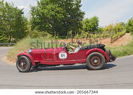 COLLE DI VAL D\'ELSA, SI, ITALY - MAY 17: the crew Dressel - Kling on a classic car Mercedes-Benz 710 SS (1929) in historical race Mille Miglia, on May 17, 2014 in Colle di Val d\'Elsa, Tuscany, Italy