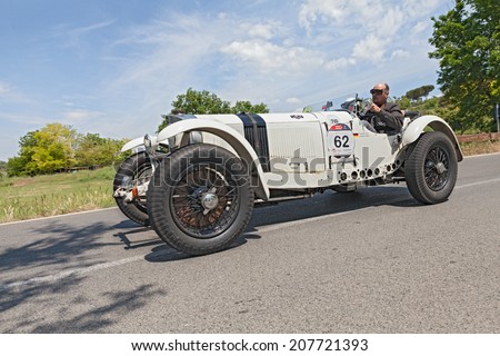 COLLE DI VAL D\'ELSA, SI, ITALY - MAY 17: the crew Kern - Abaci on a racing car Mercedes-Benz 720 SSKL (1930) in historical rally Mille Miglia, on May 17, 2014 in Colle di Val d\'Elsa, Tuscany, Italy