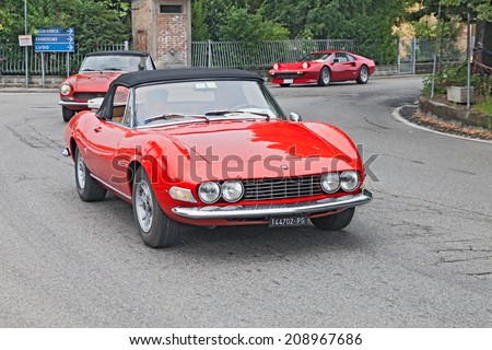 FORLI\', ITALY - JULY  27 : unidentified crew on a red vintage Fiat Dino Spyder in rally \