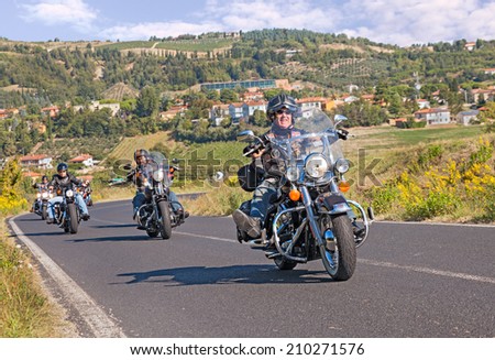 RIOLO TERME, ITALY - SEPTEMBER 22: group of bikers riding american motorbike Harley Davidson at motorcycle rally \