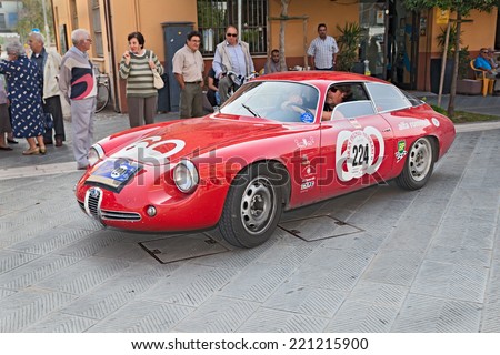 CONSELICE, RA, ITALY - SEPTEMBER 21: the crew Lingner - Stoppel on a vintage racing car Alfa Romeo Giulietta SZ (1961) in rally 