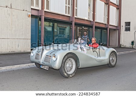LUGO, RA, ITALY - SEPTEMBER 21: the crew Sthele - Mosel on a vintage racing car Alfa Romeo 6C 2500 SS (1947) in classic cars race \