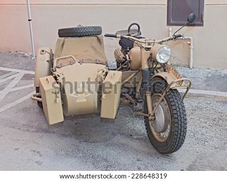FAENZA, ITALY - NOVEMBER 2: old motorcycle with sidecar made in Germany BMW R75 750 cc, at the military vehicle rally during the festival \