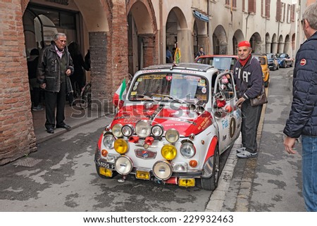 BAGNACAVALLO, RA, ITALY - NOVEMBER 9: driver with a vintage custom car Fiat 500 F in classic cars rally during the feast \