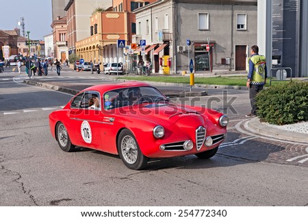 LUGO, RA, ITALY - SEPTEMBER 21: the crew M. Rivolta A. Zagato on a vintage racing car Alfa Romeo 1900 SSZ (1957) in classic car rally \