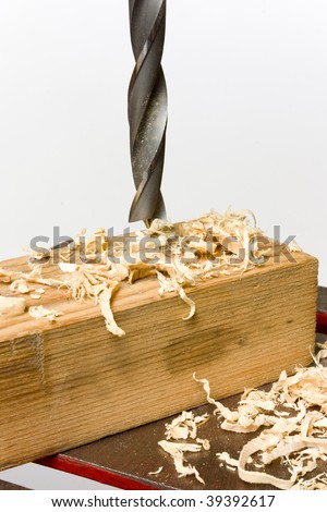 Drilling wood with a special bit - carpentry tool for wooden working